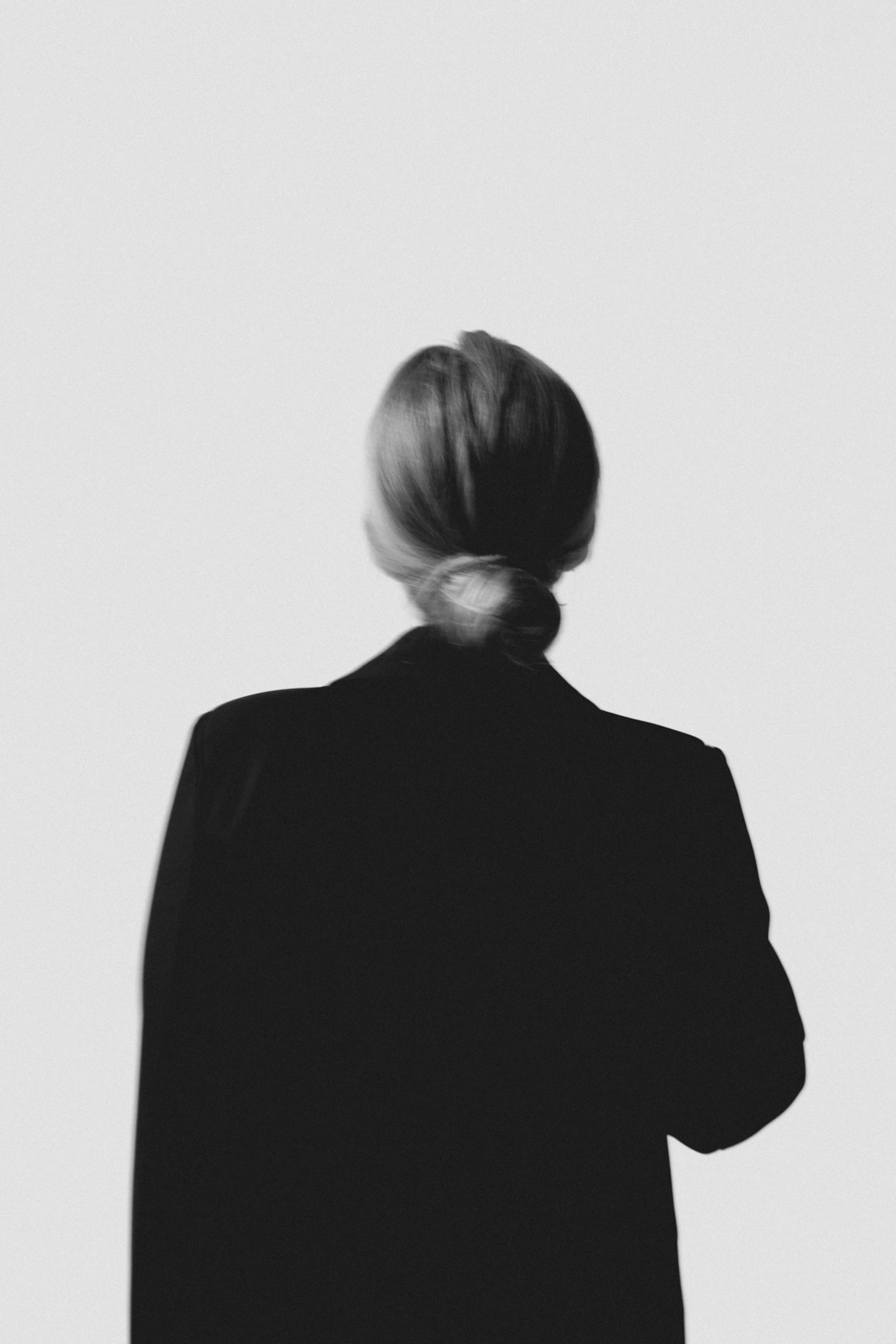 Editorial fashion portrait seen from behind